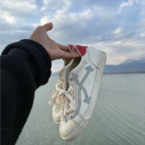 Off-White Sneakers with Gray and Red Accents